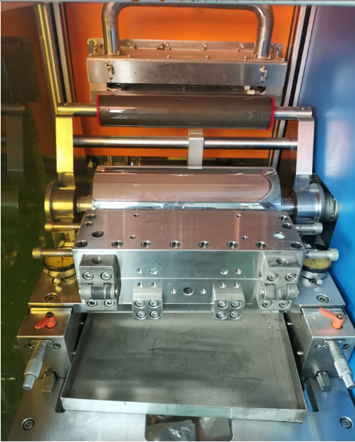 เครื่องเคลือบอิเล็กโทรดแบบช่องรีด เครื่องเคลือบอิเล็กโทรดแบบช่องรีด